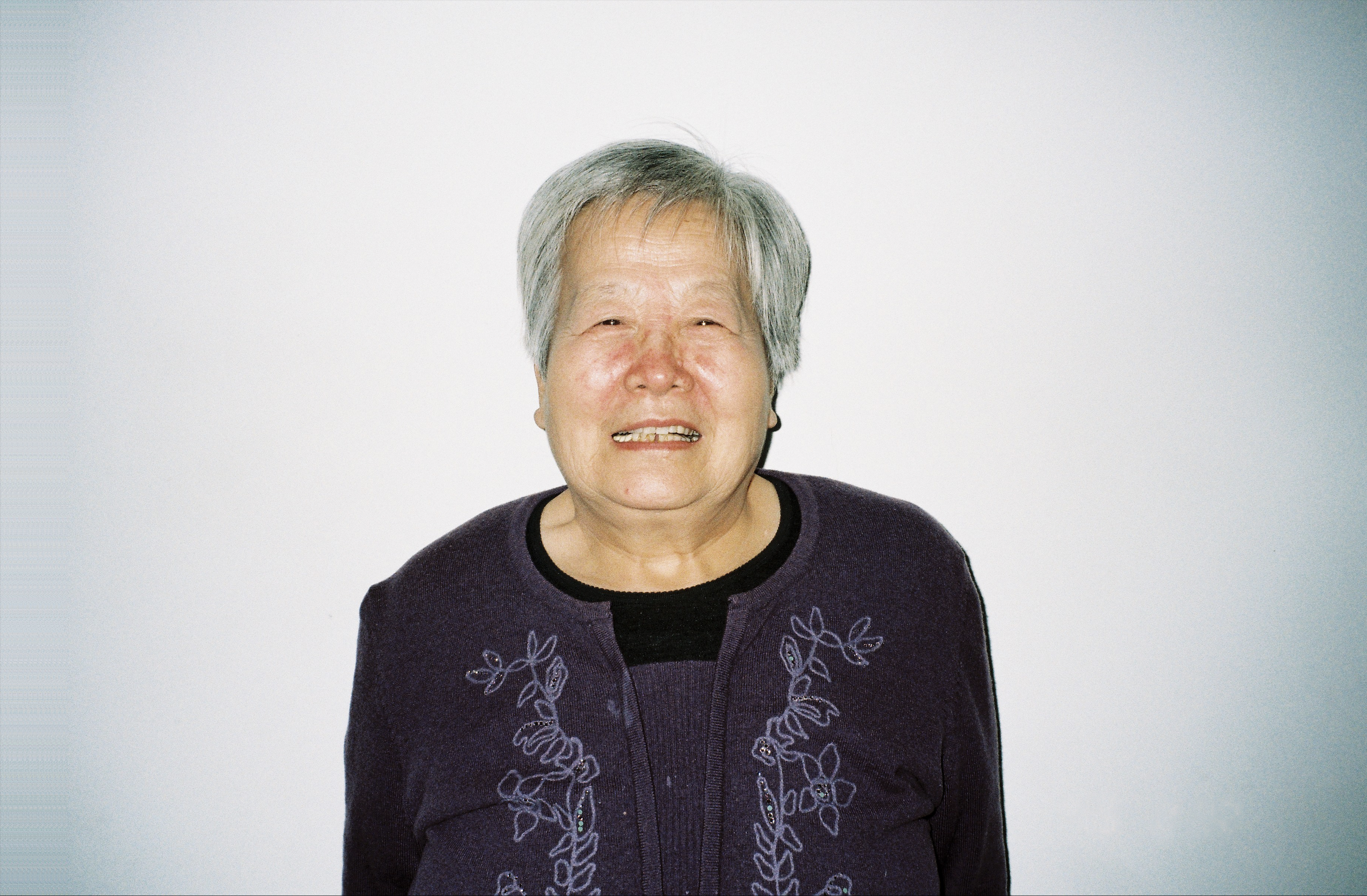 Portrait of an older woman smiling at the camera
